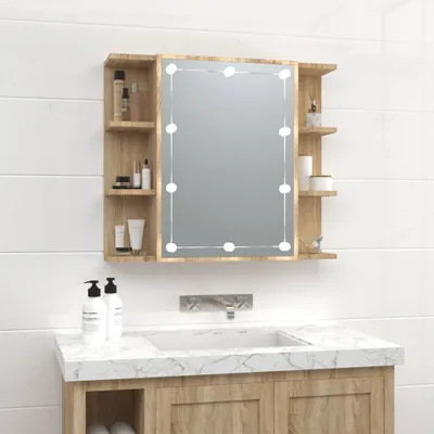 A bathroom vanity with a medicine cabinet and sink.