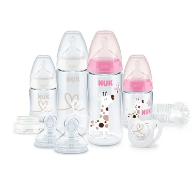 Produktbild von NUK Perfect Start First Choice+ Babyflaschen-Set | 06 Monate | 4 x Flaschen mit Temperaturkontrolle, Schnuller, Flaschenbürste & mehr | -frei | 10-teilig | rosa Giraffe