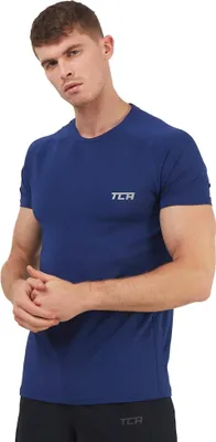 Produktbild von TCA Herren Stamina Laufshirt/Trainingsshirt mit versteckter Reißverschlusstasche - Dunkelblau, XL