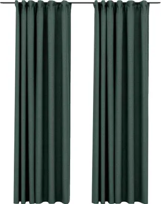 Two dark green curtains hanging from a rod against a white background.