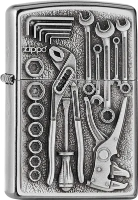 A Zippo lighter with a detailed engraving of various tools.