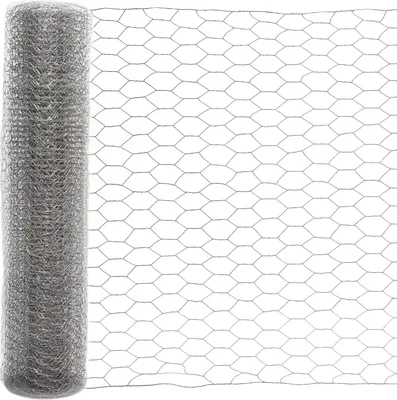 A roll of galvanized hexagonal wire mesh, commonly known as chicken wire or rabbit wire, is shown against a white background. The mesh has a hexagonal pattern with a hole size of 27mm.