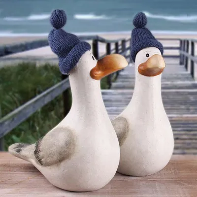 Produktbild von Möwe Hinnerk mit Pudelmütze maritime Dekoration 18x21 cm - 2er Set