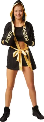 A woman is posing in a boxer costume against a white background.