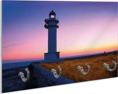 Produktbild von Wallario Schlüsselbrett aus Glas, Motiv: Leuchtturm am Abend auf den Balearen Malerischer Himmel, 30 x 20 cm mit 4 Haken