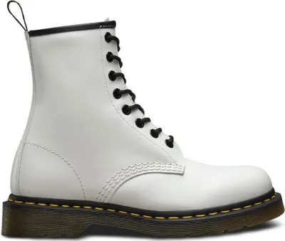 A single white Dr. Martens boot shown from the side against a white background.