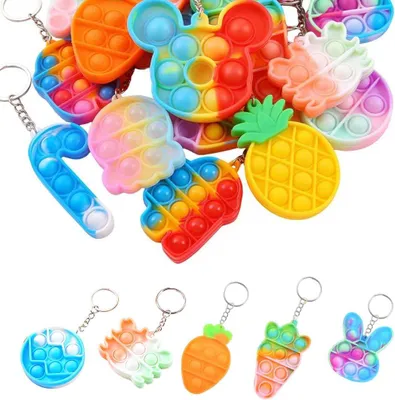 Productafbeelding van Sleutelhangers voor kinderen - Set van 20 - Pop mini fidget toys - Feestaccessoires - Gevulde geschenkzakjes - Kleurrijk