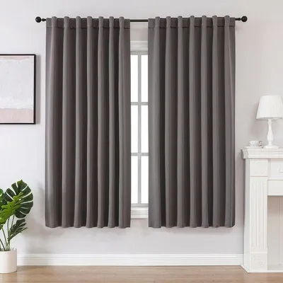 Immagine prodotto di Tende oscuranti Unyqoos®, set di 2 pezzi, 100% poliestere, occhielli invisibili, altezza 158 cm, larghezza 106 cm – riducono la luce (fino all'80%), isolanti termicamente