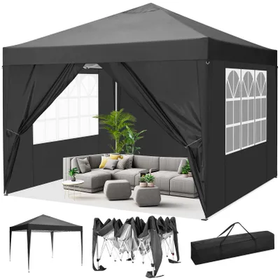A black pop-up gazebo set up with outdoor furniture inside, and a folded gazebo and carrying bag shown below.