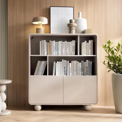 Productafbeelding van Orion Regal 108 cm, bekleed met kasjmier, met open vakken, een deur aan de onderkant, afgeronde zijkanten en bolvormige poten – modern en functioneel