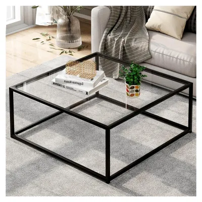 Produktbild von Couchtisch aus Glas in Schwarz, quadratischer Wohnzimmertisch mit Metallgestell, Beistelltisch für Wohnzimmer, Balkon und Büro, transparentes Glas