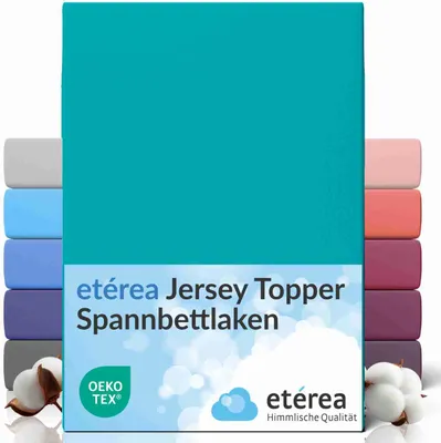 A stack of folded bed sheets in various colors, with the main product in teal prominently displayed.