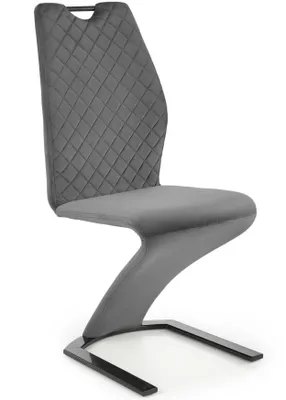 A gray dining chair with a modern, cantilever base.