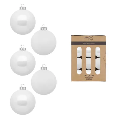 A collection of white Christmas ornaments and their packaging.