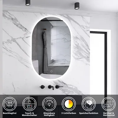 A modern bathroom with a marble-tiled wall, featuring an oval LED mirror with integrated lighting. Below the mirror are black faucets and a dark vanity. The bottom of the image displays icons and text highlighting product features.