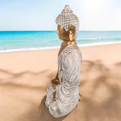 Produktbild von Buddha-Dekorationsfigur in Gold und Weiß im Vintage-Look, Polyharz 14-34 cm, 21 x 13 x 34 cm, inklusive Teelichthalter - Spiritualität und Eleganz hinzufügen