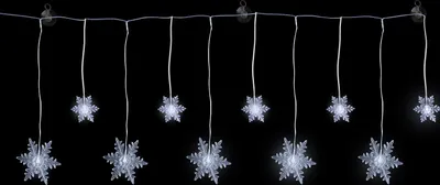 A string of snowflake-shaped LED lights against a black background.