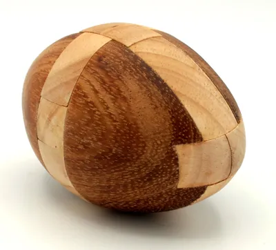 Produktbild von Rugby Ei Holz Puzzle Knobel-Spiel für Knobelfreunde 11 x 7 cm