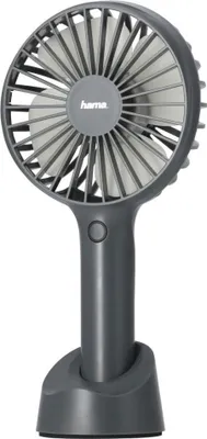 A dark gray portable fan with its charging stand, isolated on a white background.