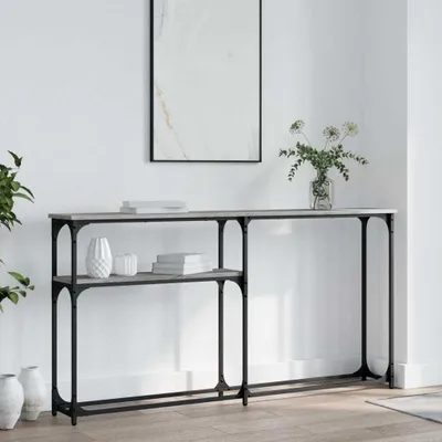 A console table with shelves is displayed against a white wall.