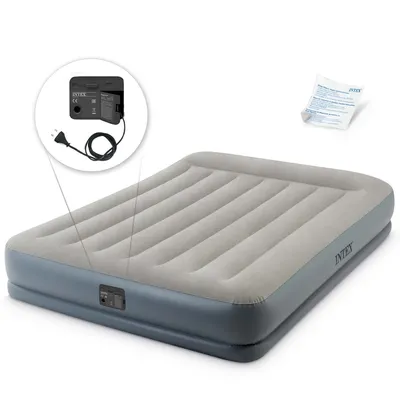An inflatable air mattress with an integrated pump and a small instruction manual.
