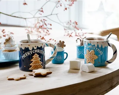 Produktbild von Tasse mit Lebkuchen Keramik 9.5cm hellblau / dunkelblau, 1 Stück sort.