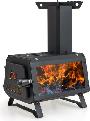 A black outdoor rocket stove with a glass window showing flames and burning wood, set against a white background.