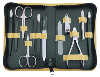 Produktbild von Maniküre Pediküre Set 12-teilig – Nagelpflege Set mit 5 Solingen Qualitätsinstrumenten, Echtleder Etui, gehärteter Stahl –  Germany Gelb / Dollaro