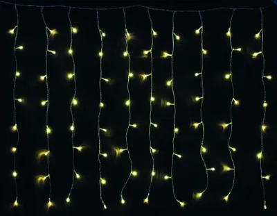 A string of warm white LED lights against a black background.