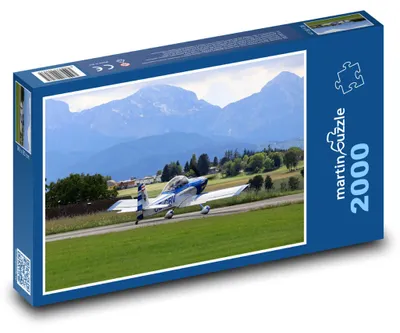 Produktbild von Puzzle 2000 Flugzeug in den Bergen - martinpuzzle