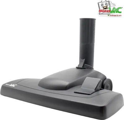 A black vacuum cleaner floor head is shown against a white background. A logo for 'MisterVac' is present in the upper right corner.
