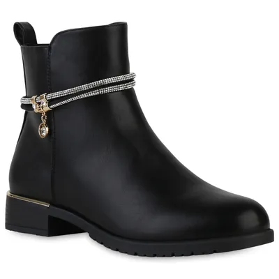 A black ankle boot with decorative embellishments.