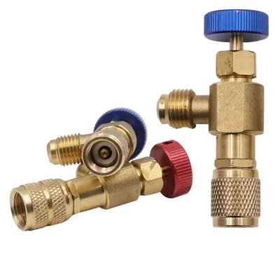 Immagine prodotto di Valvola Rosfix per il riempimento di impianti di refrigerazione con refrigerante R32, in basso R410, sul lato R410 rosso