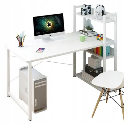 A white computer desk with a computer, monitor, and shelves, set against a white background.
