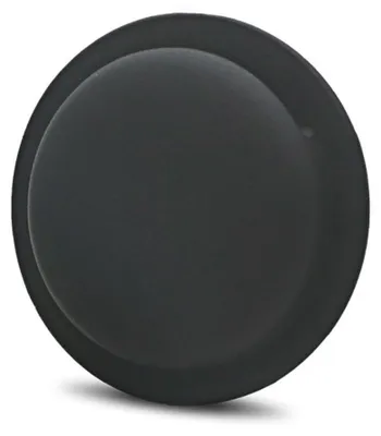 A black circular object, likely a protective cover or accessory, is presented against a light gray background.