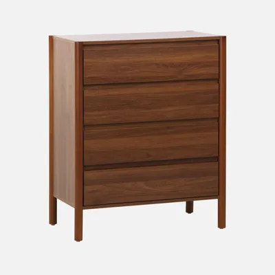 A wooden chest of drawers with four drawers.