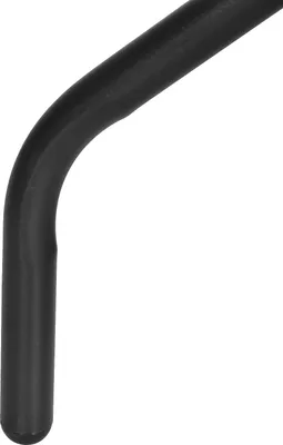 A close-up of a black metal table leg with a curved shape.