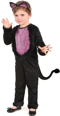A young girl is posing in a black cat costume.