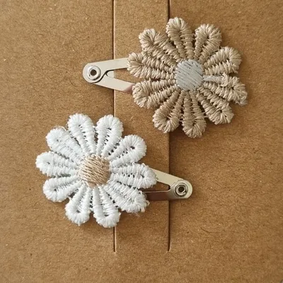 Produktbild von Ootje Kadootje Spitzenblume / Haarspange mit großer Schleife Sand