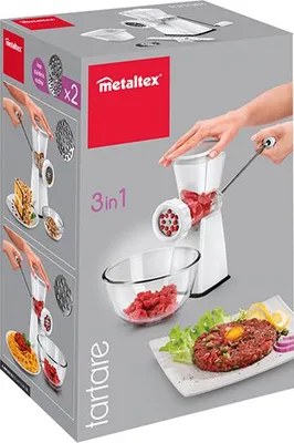 The image shows the packaging of a Metaltex 3-in-1 meat grinder, also known as a 'tartare' maker. The packaging displays the product in use and its various attachments.