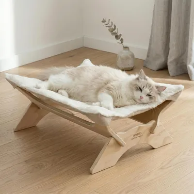 Immagine prodotto di Cuccia per gatti, in peluche e velluto, tipo amaca, con struttura in legno, dimensioni 54 x 42 x 21 cm, colore bianco