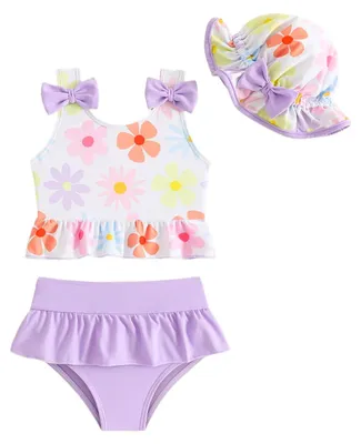 Imagen del producto de Traje de baño para bebé con protección UV, conjunto de 3 piezas, estampado de flores moradas, tallas 74-98, ideal para proteger del sol