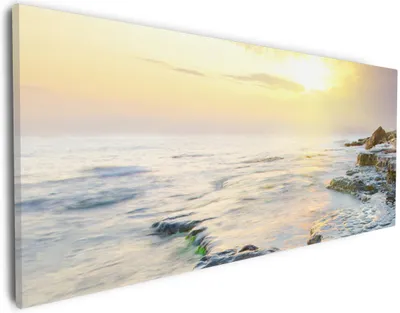 Produktbild von Wallario Premium Leinwandbild Sonnenuntergang über dem Meer in Größe 30 x 75 cm