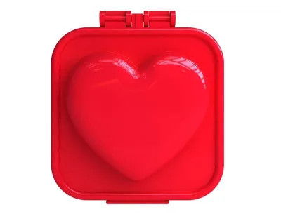 A red heart-shaped egg mold is shown against a white background.