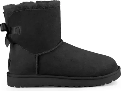 A black UGG boot with a bow on the back.