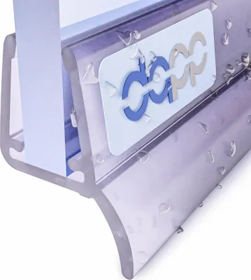 A close-up of a transparent shower seal with a logo on it.