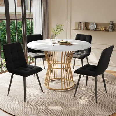 Immagine prodotto di Set da pranzo composto da 5 pezzi, tavolo rotondo da 100 cm con 4 sedie rivestite in velluto nero, gambe in metallo dorato e piano in MDF bianco.