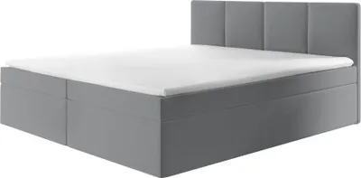 A grey upholstered bed with a white mattress and a panel headboard, shown against a white background.