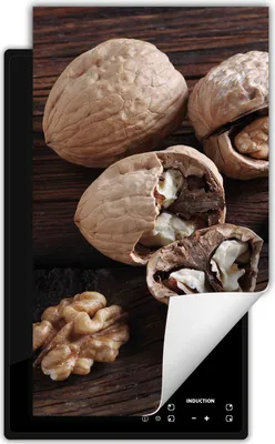Produktbild von DarHaus Herdabdeckplatte 1 teilig 30x52 cm Anti Rutsch Matte Aufrollbar, Nüsse