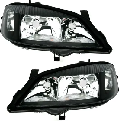 Produktbild von TYC Scheinwerfer Set in Schwarz für Opel Astra G 3/1998-5/2004 H7 HB3 für elektr